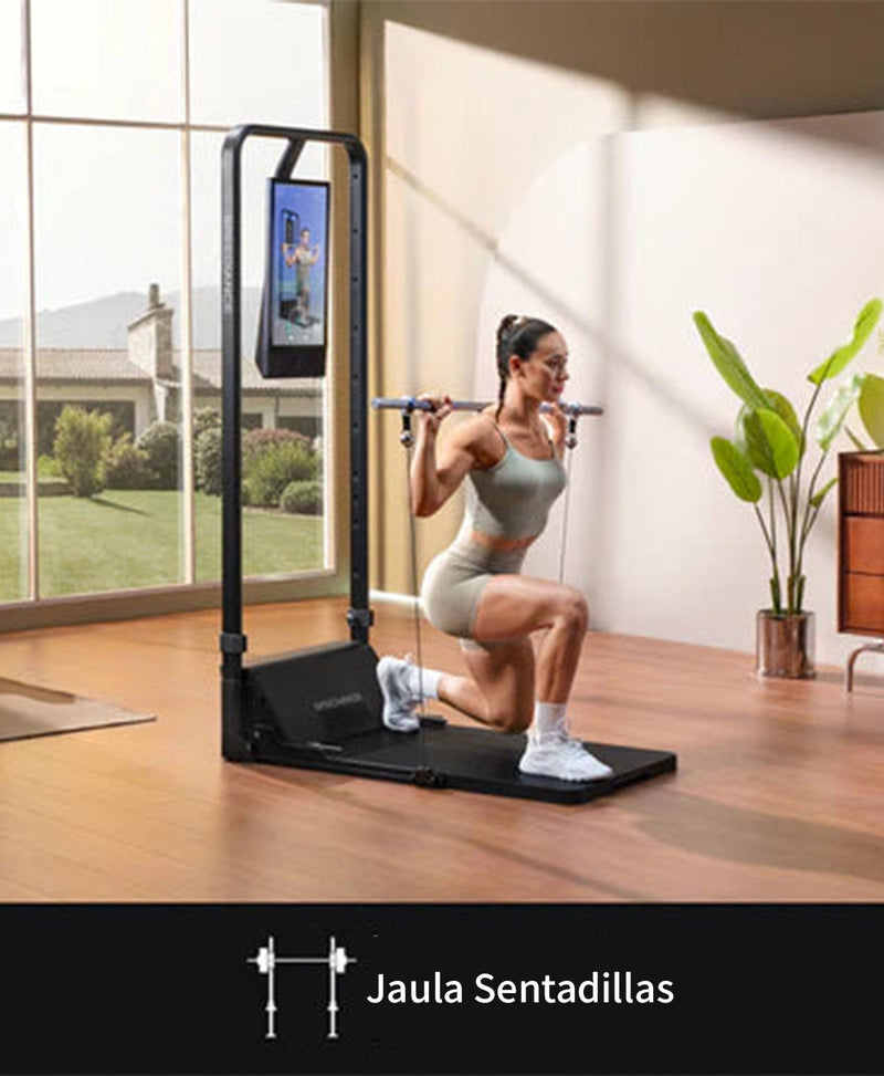 Mujer haciendo sentadillas con barra en la Gym Monster 2