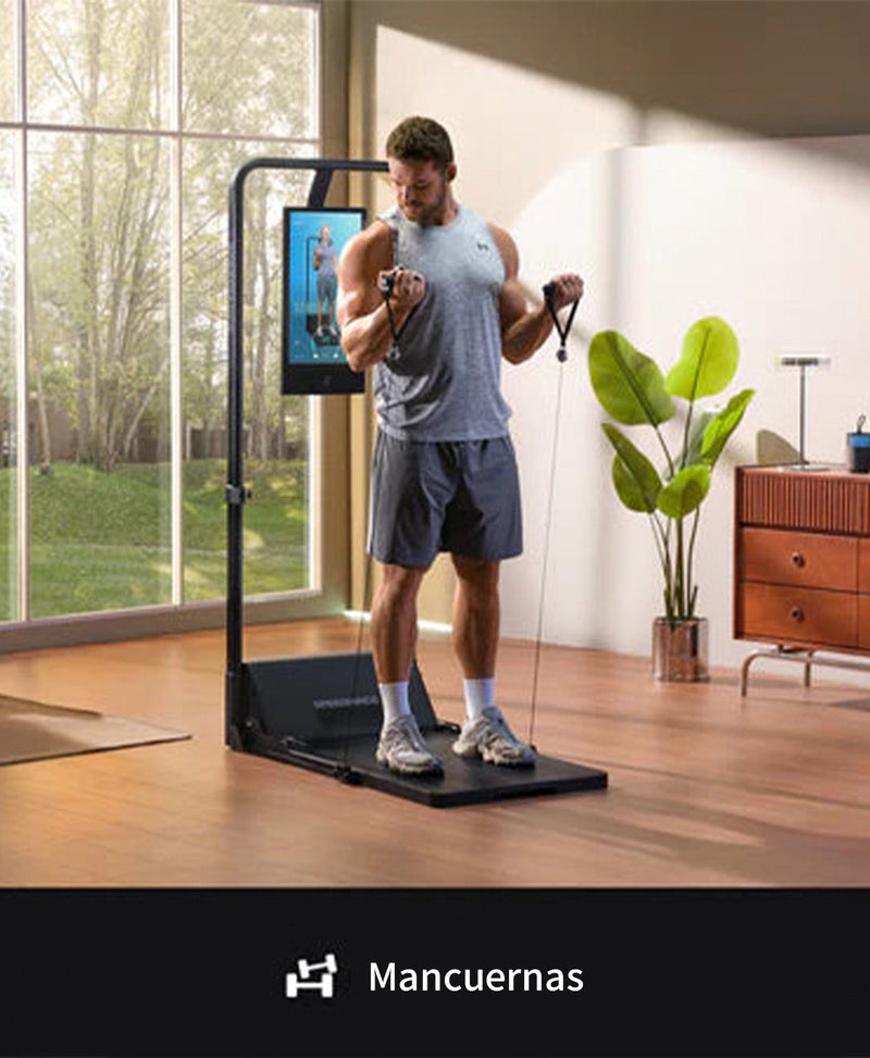 Hombre entrenando con mancuernas en la Gym Monster 2
